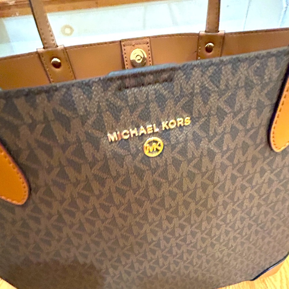 Michael Kors handbag with attached smaller bag inside.  Excellent condition
